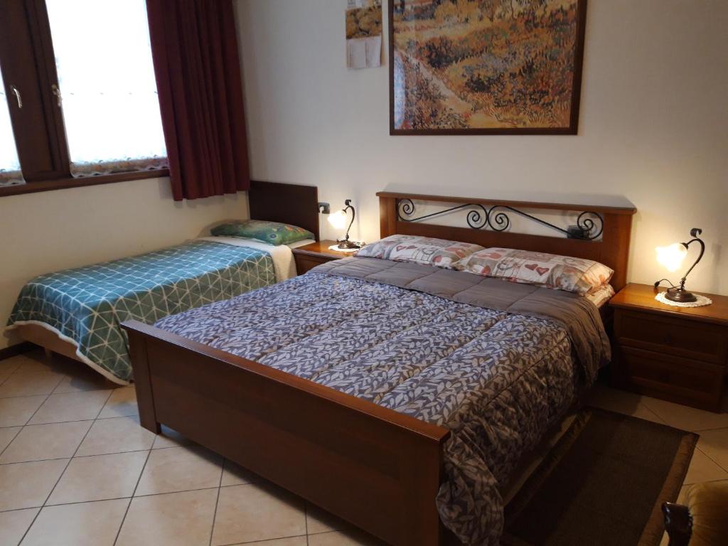 Postel nebo postele na pokoji v ubytování BorgoAntico Affittacamere