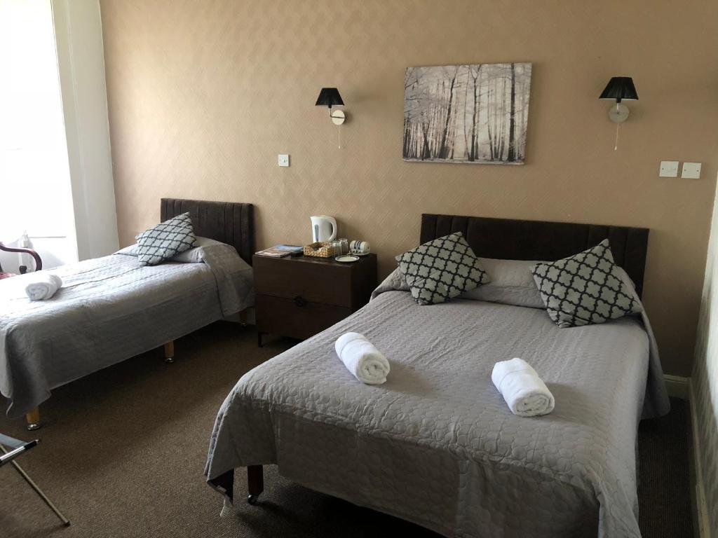 Letto o letti in una camera di Atlas Guest House
