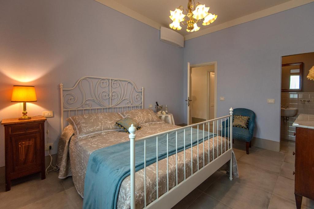 Posteľ alebo postele v izbe v ubytovaní Agriturismo Villa Ulivello in Chianti