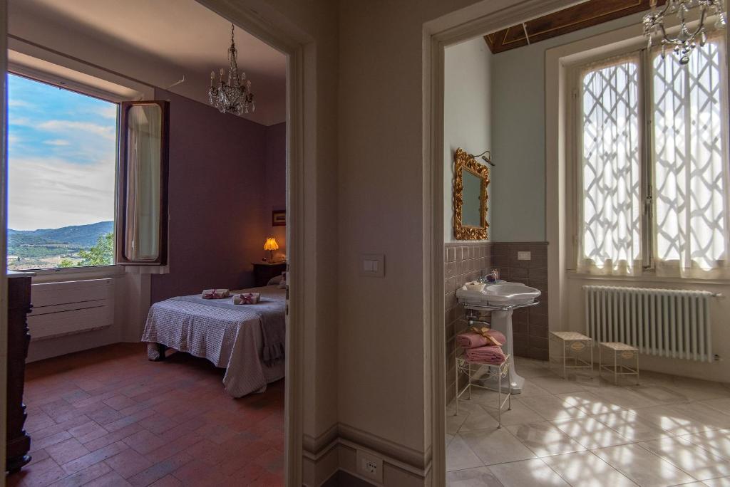 Posteľ alebo postele v izbe v ubytovaní Agriturismo Villa Ulivello in Chianti