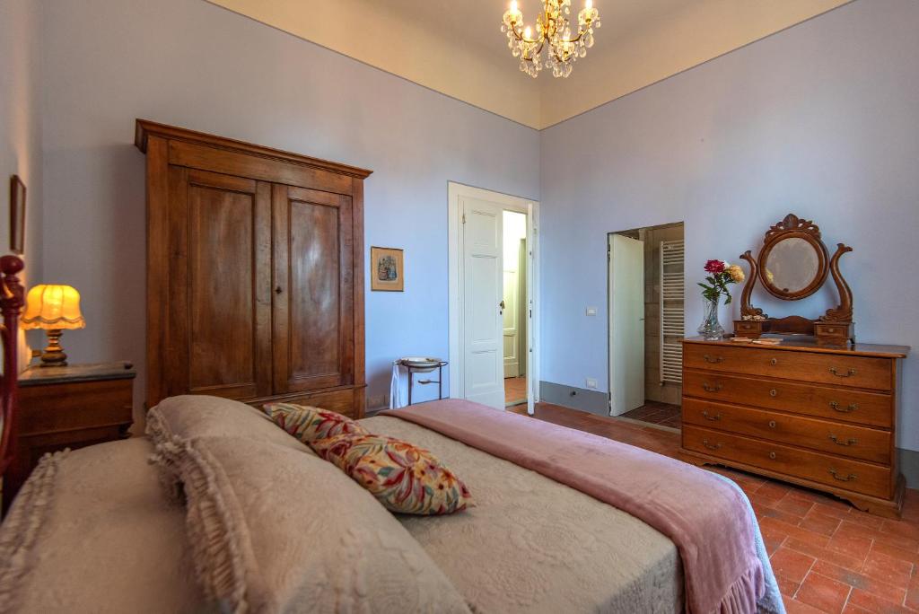 Posteľ alebo postele v izbe v ubytovaní Agriturismo Villa Ulivello in Chianti