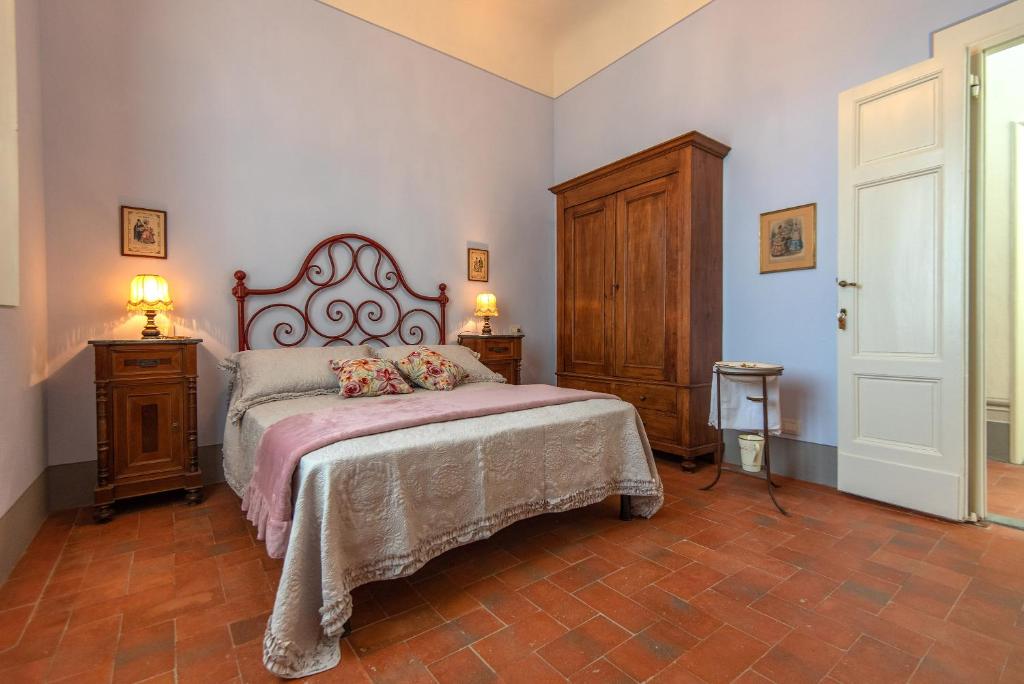 Posteľ alebo postele v izbe v ubytovaní Agriturismo Villa Ulivello in Chianti