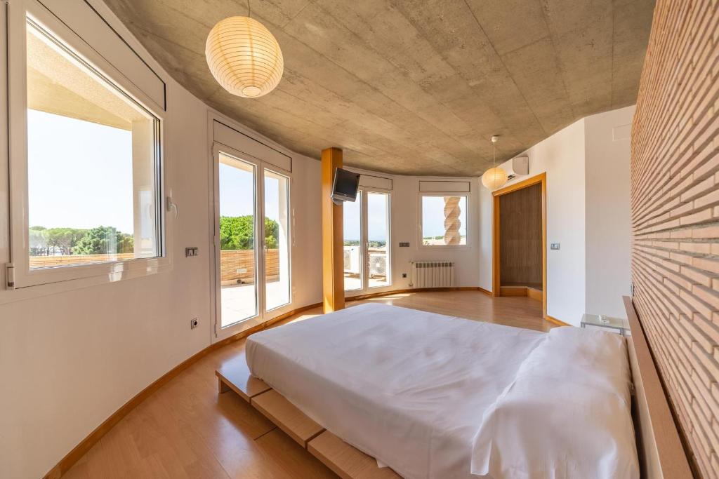 Postel nebo postele na pokoji v ubytování Villa Eugenia