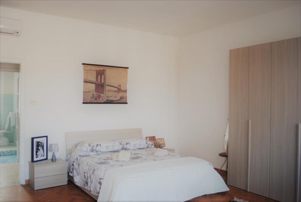 Postel nebo postele na pokoji v ubytování Dreaming Verona Rooms