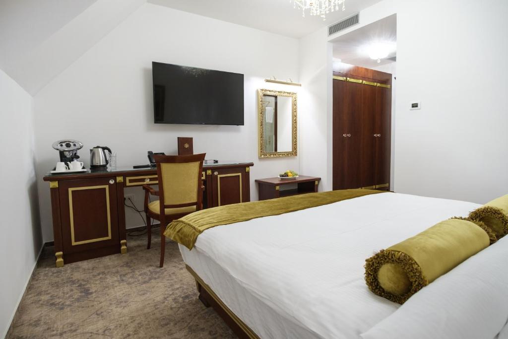 Ein Bett oder Betten in einem Zimmer der Unterkunft Integra Hotel