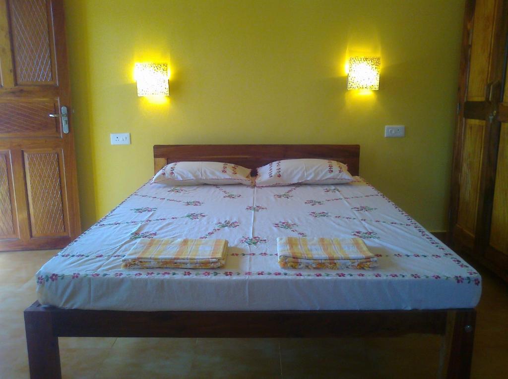 Letto o letti in una camera di Avalon Inn