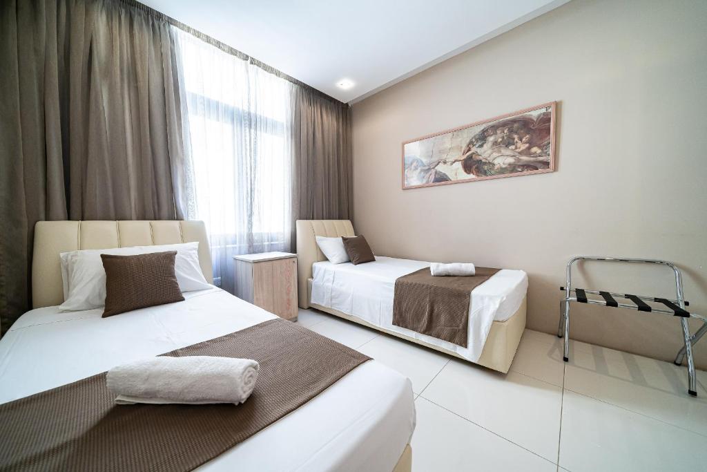 Postel nebo postele na pokoji v ubytování Marsalforn Apartment Del Mar