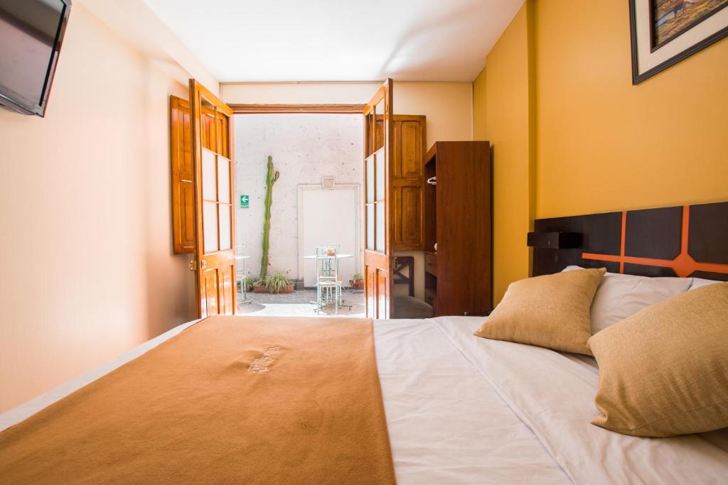 Cama ou camas em um quarto em Villa Sillar