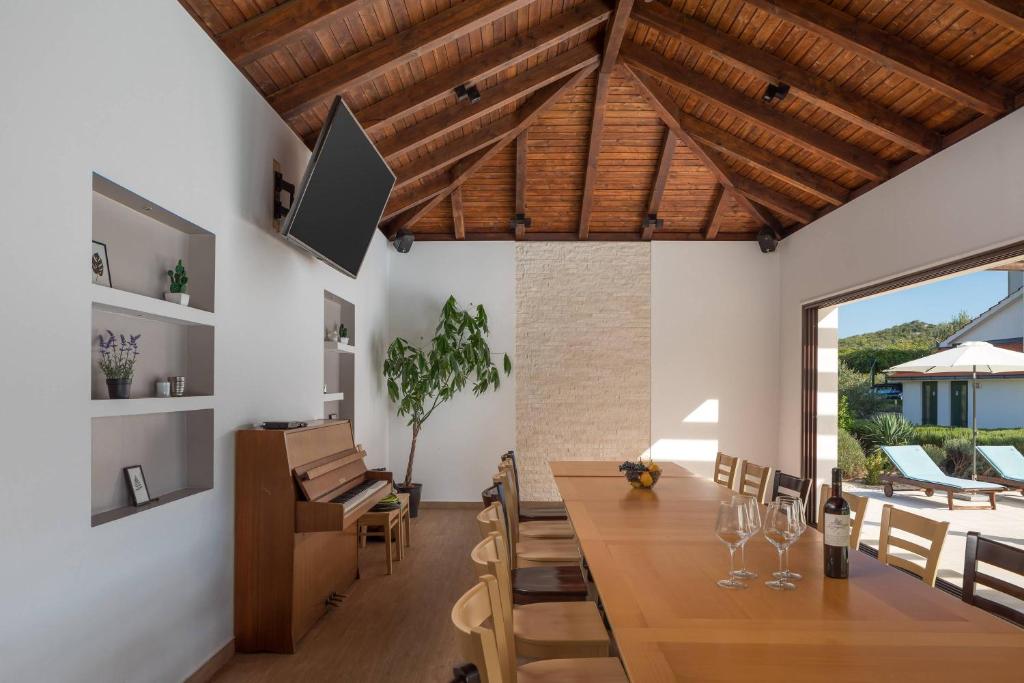 TV a/nebo společenská místnost v ubytování Villa DIVA Holiday House