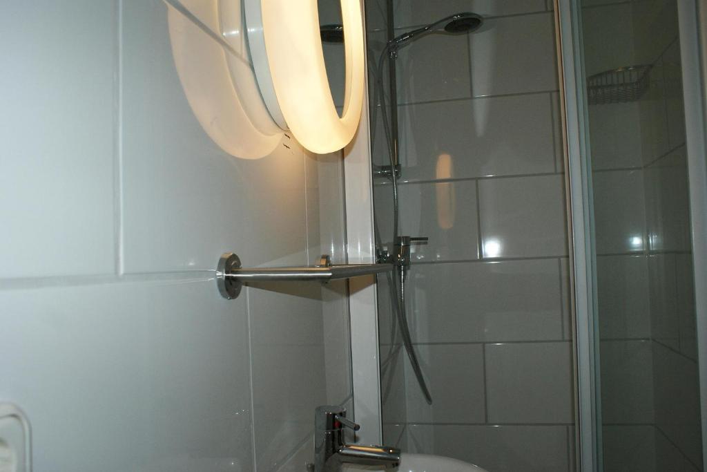 Koupelna v ubytování Hotel Garni Aaberna