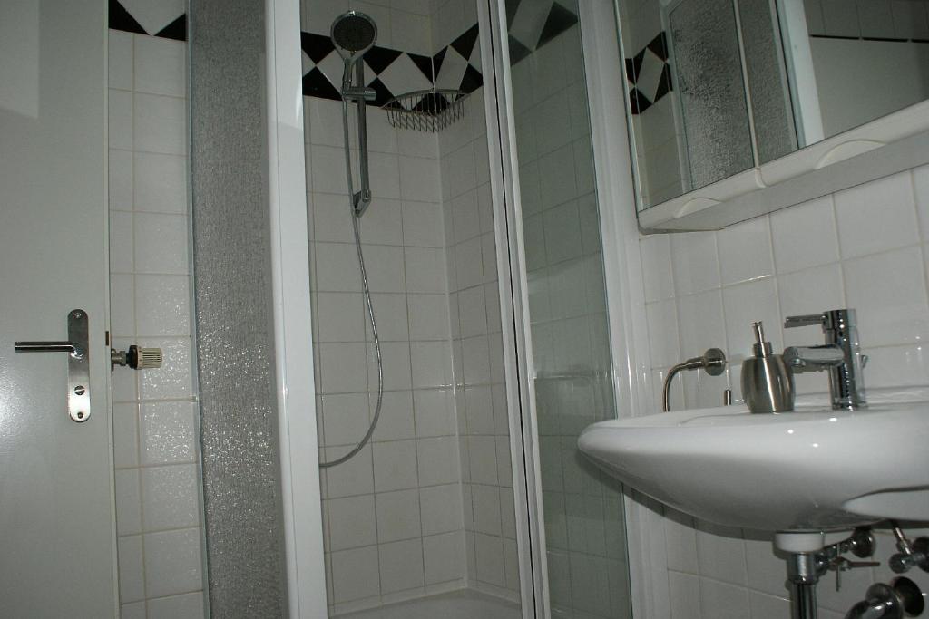 Koupelna v ubytování Hotel Garni Aaberna