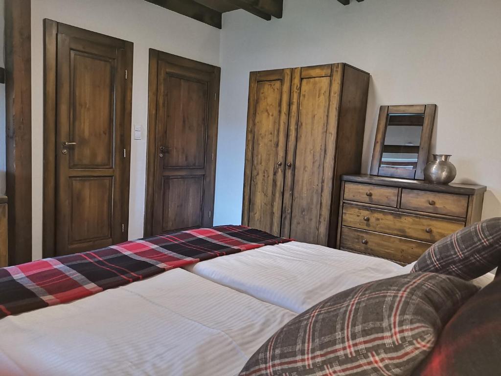 Postel nebo postele na pokoji v ubytování Family apartment in Tatranska Lomnica