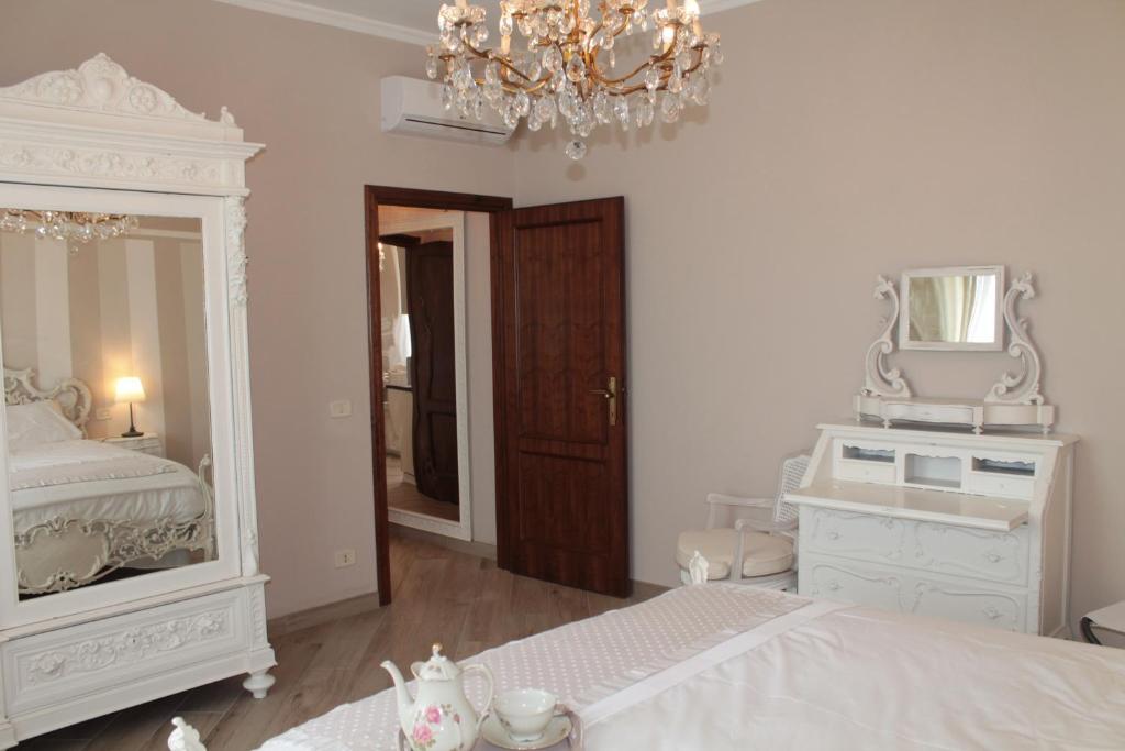 Postel nebo postele na pokoji v ubytování La Valinfiore Charming Home