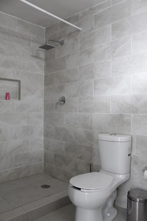 Koupelna v ubytování Suites ciento 37