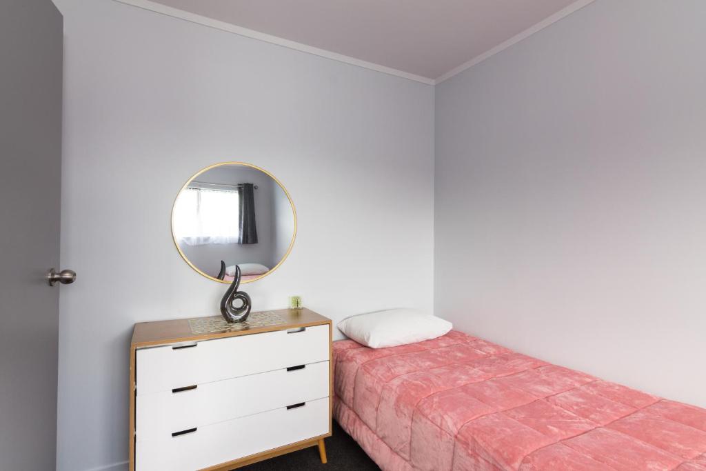 Postel nebo postele na pokoji v ubytování Kaitaia Motor Lodge