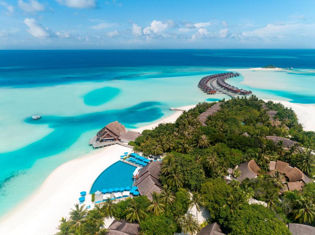 an aerial view of an island in the ocean at Anantara Dhigu Maldives Resort in South Male Atoll