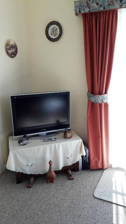TV a/nebo společenská místnost v ubytování Rivendell