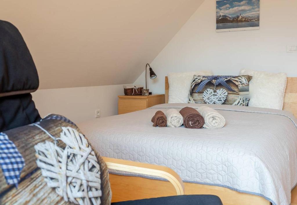 Postel nebo postele na pokoji v ubytování Alpeambient house Dovje