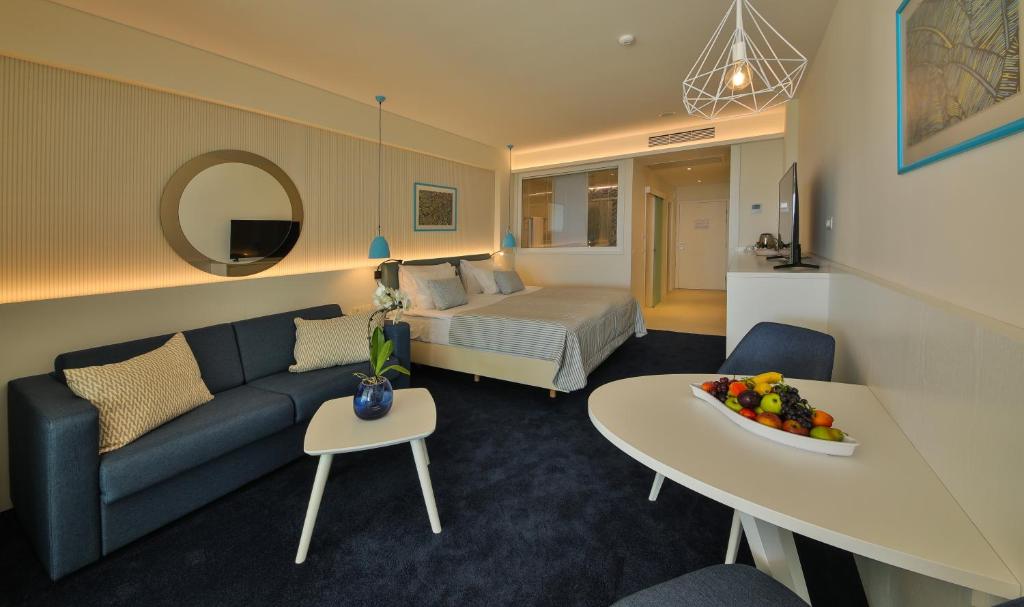 Кровать или кровати в номере White Lagoon Resort - All Inclusive