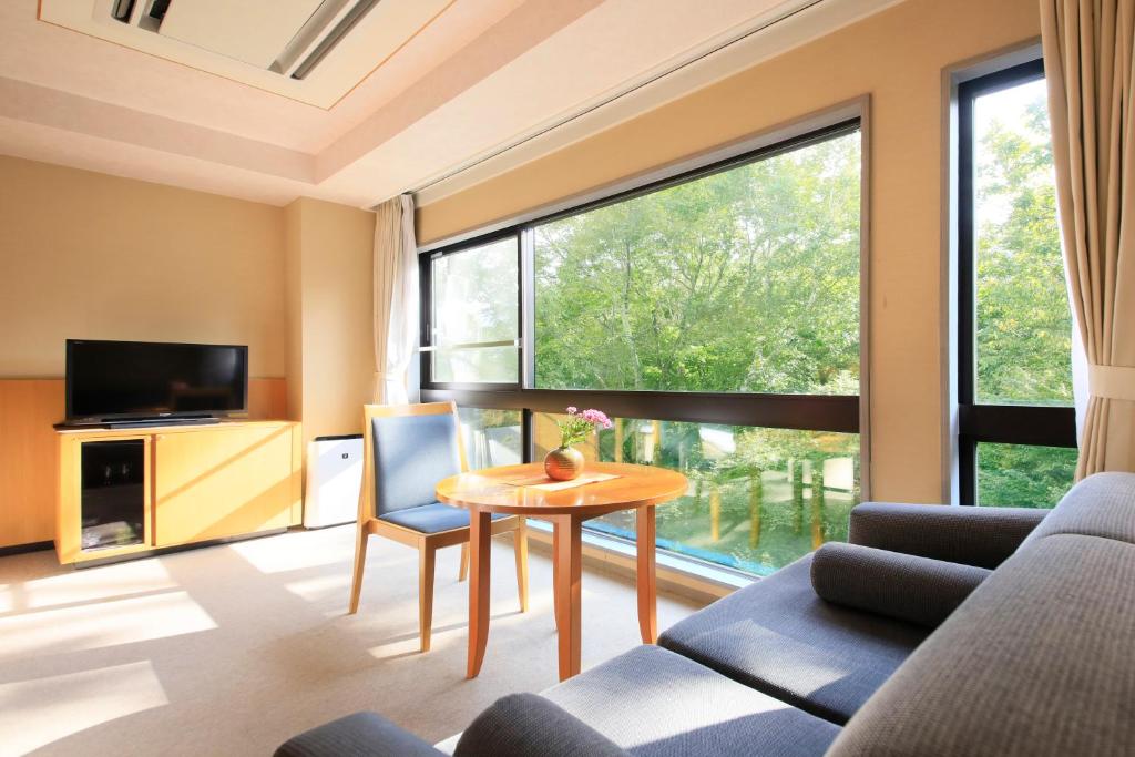 TV a/nebo společenská místnost v ubytování Hotel Shikisai