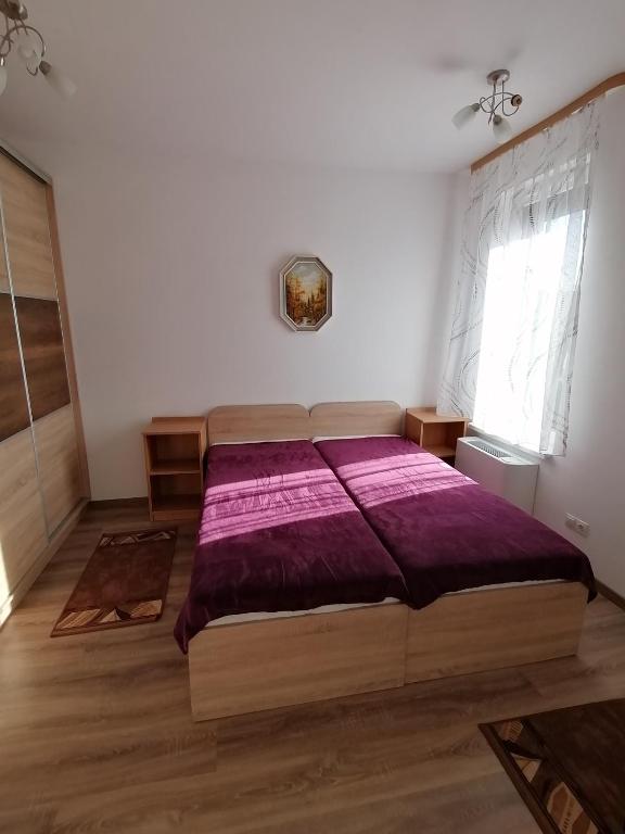 Posteľ alebo postele v izbe v ubytovaní Ádám Guesthouse I.