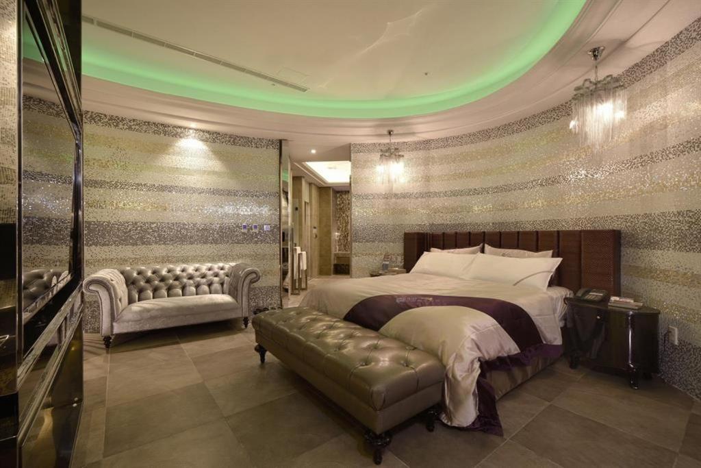 Katil atau katil-katil dalam bilik di U-Her Hotel