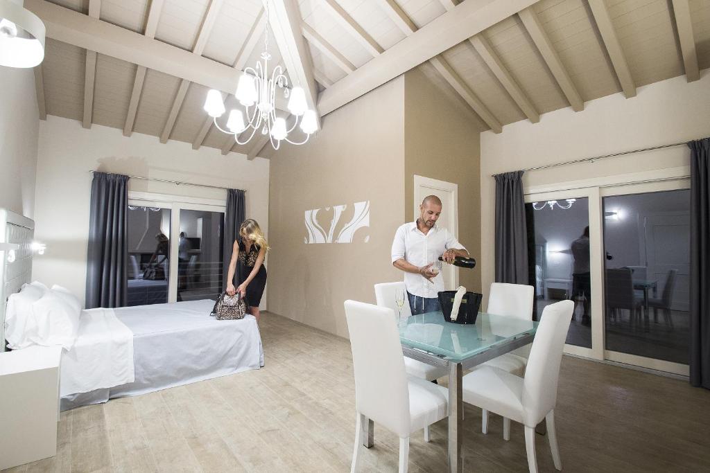 Łóżko lub łóżka w pokoju w obiekcie Relais I Piastroni