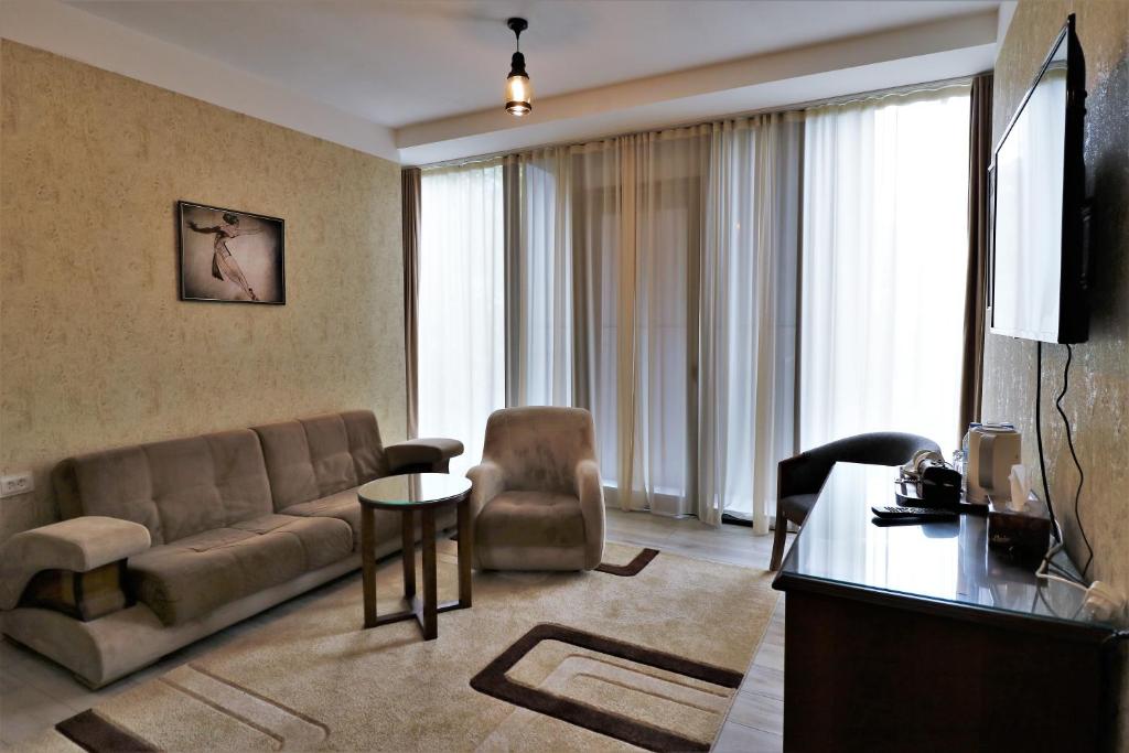 TV a/nebo společenská místnost v ubytování Hotel Liberty Theatre