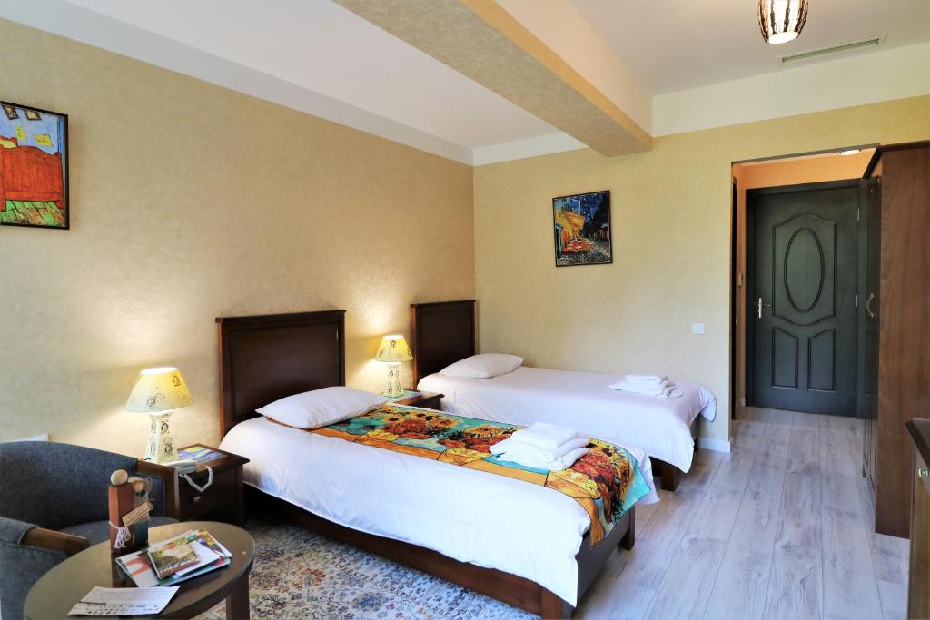 Postel nebo postele na pokoji v ubytování Hotel Liberty Theatre