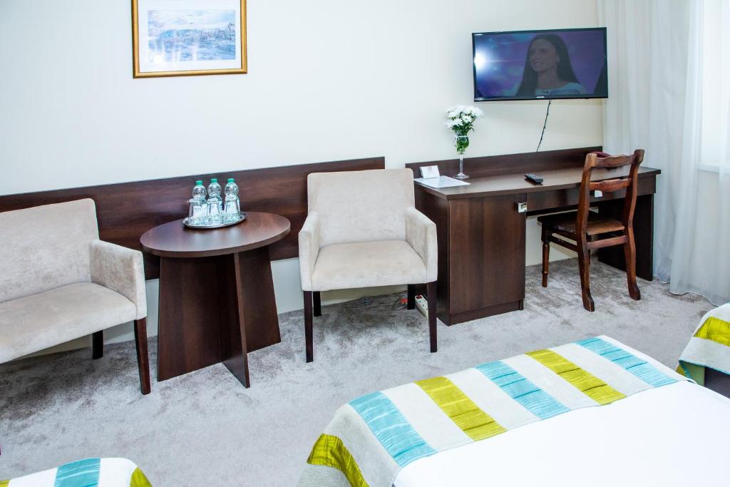 Posteľ alebo postele v izbe v ubytovaní Hotel Alexandra