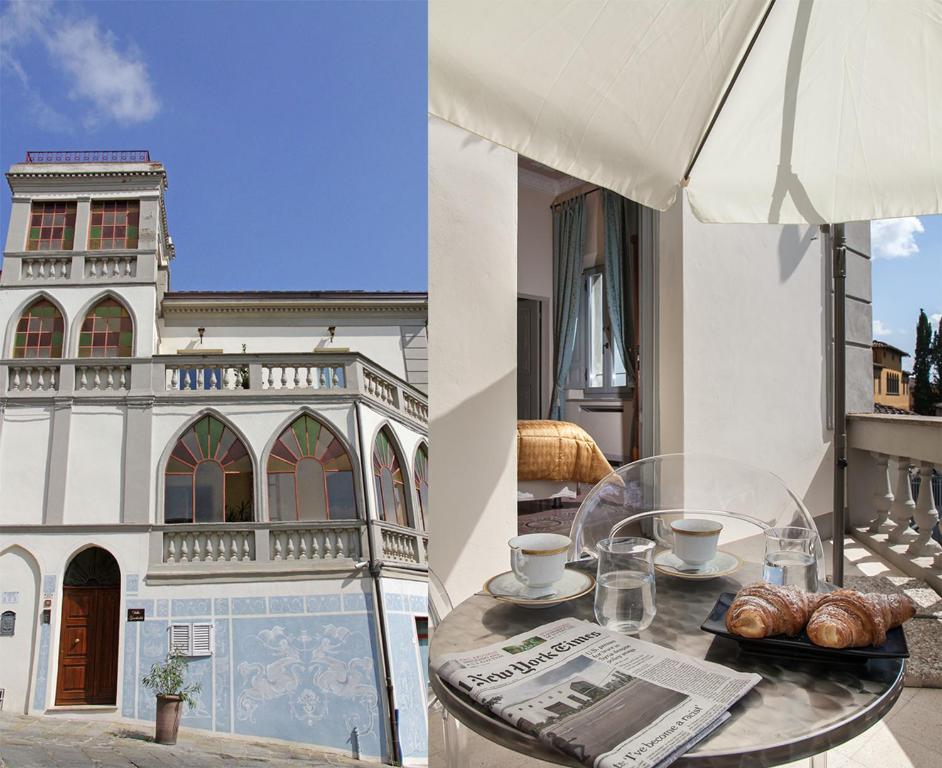 貝托雷的住宿－Villa Garibaldi，一张带羊角面包的桌子和一个阳台上的一座建筑