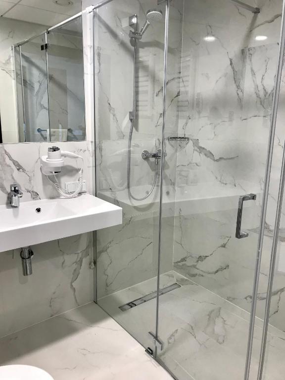 Koupelna v ubytování Trofana Wellness & SPA