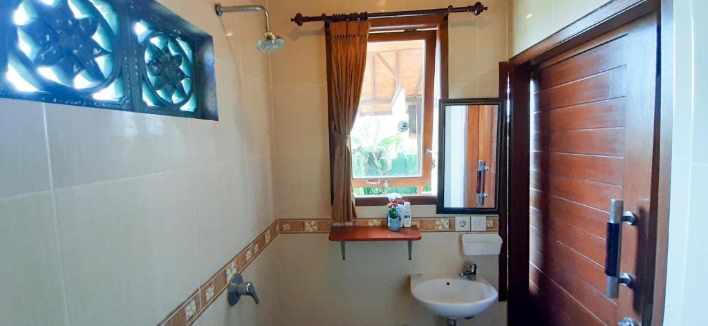 Koupelna v ubytování Ubud Batik Villa