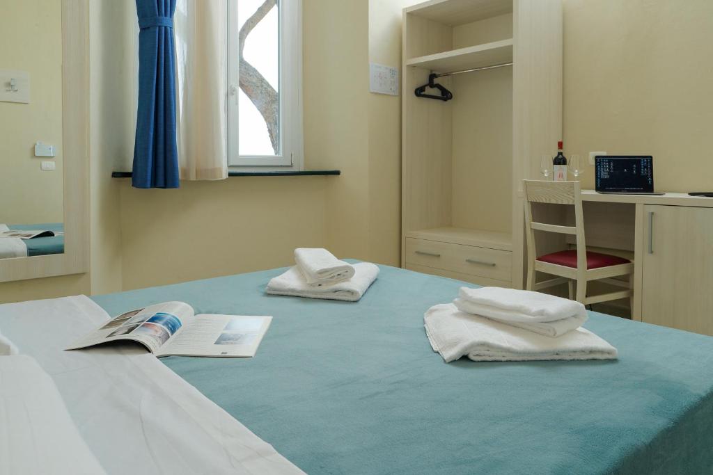 Posteľ alebo postele v izbe v ubytovaní Hotel Il Mulinaccio