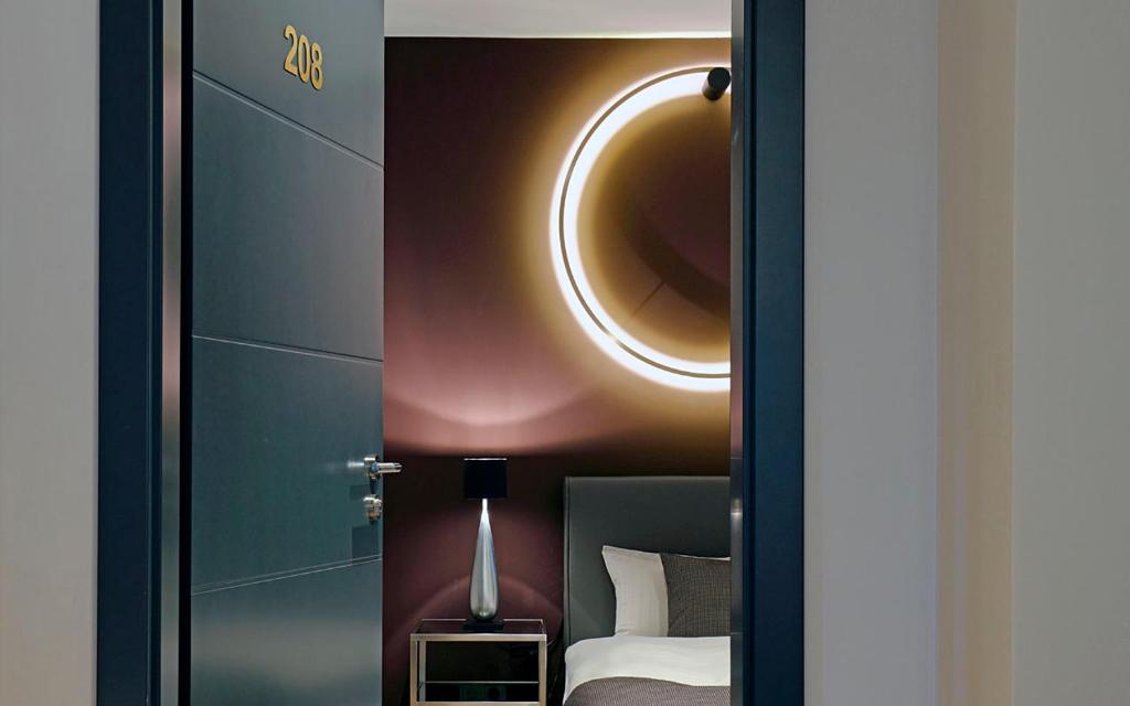 Postel nebo postele na pokoji v ubytování Patentkrug Design Hotel