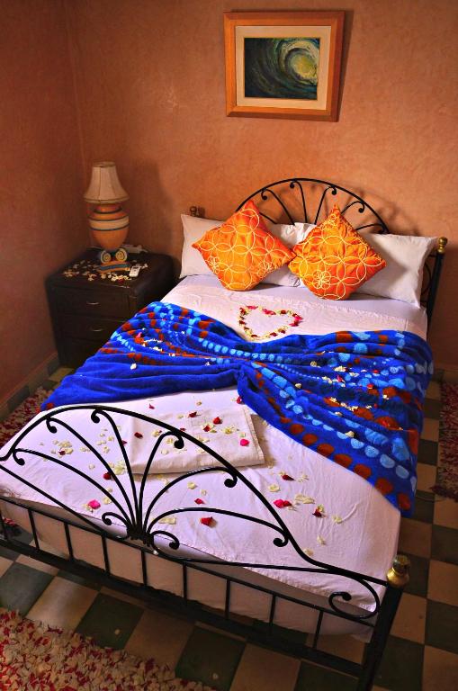 Postel nebo postele na pokoji v ubytování Riad Wink