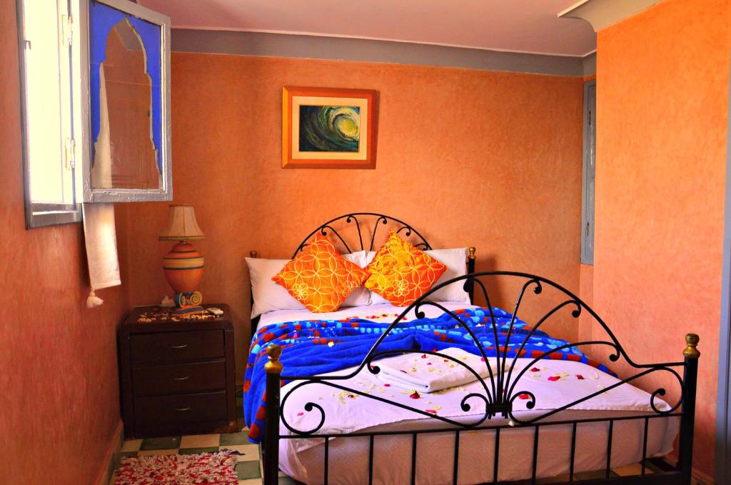 Postel nebo postele na pokoji v ubytování Riad Wink