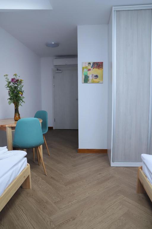 Łóżko lub łóżka w pokoju w obiekcie ArtRooms Pokoje Gościnne