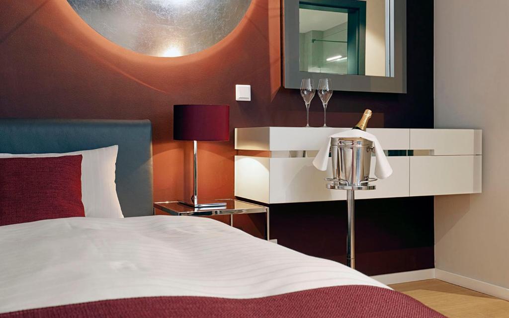 Postel nebo postele na pokoji v ubytování Patentkrug Design Hotel