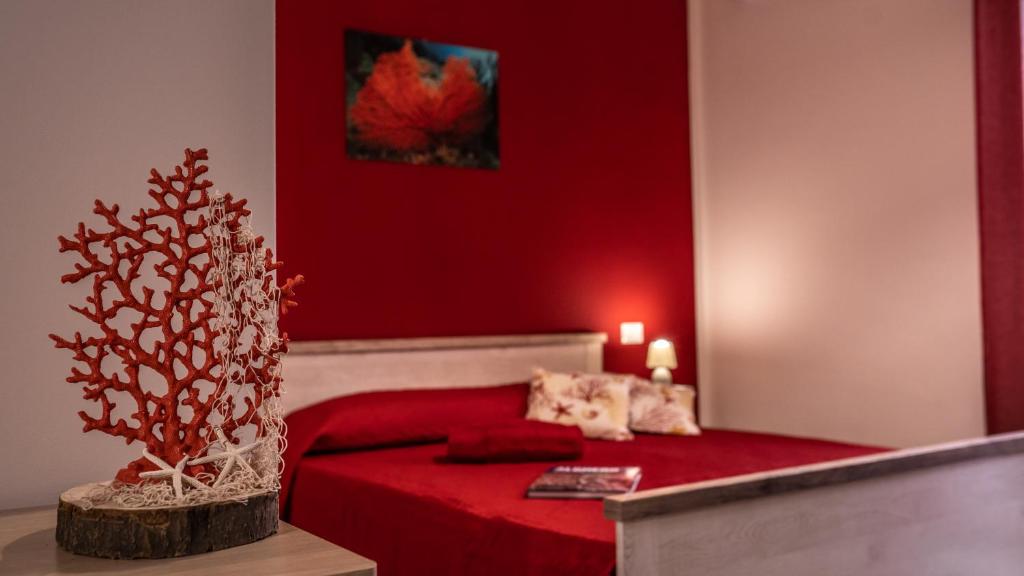 Postel nebo postele na pokoji v ubytování BOSS Guest House