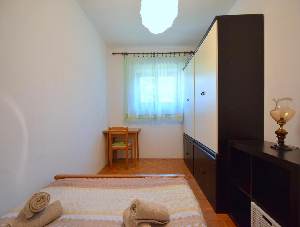 Postel nebo postele na pokoji v ubytování Apartments Blazevic