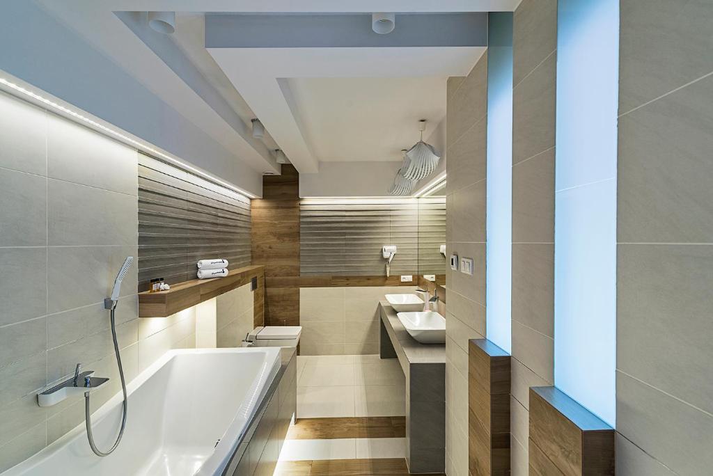 Kúpeľňa v ubytovaní JJ Sport Concept Hotel