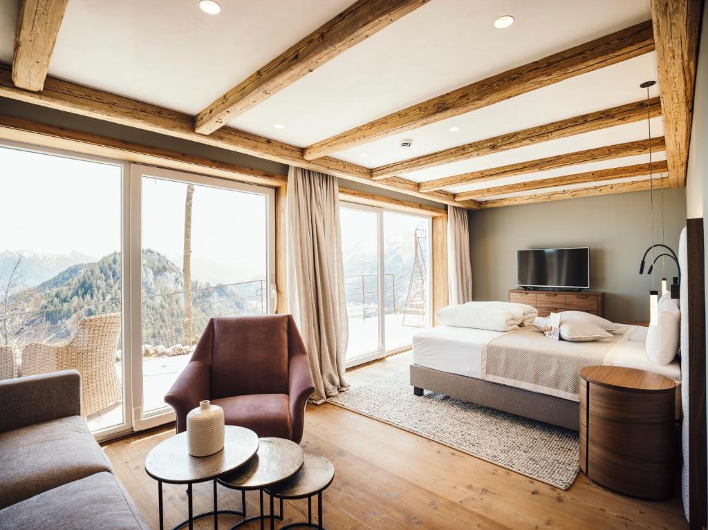 Postel nebo postele na pokoji v ubytování Boutiquehotel Blaue Burg Falkenstein