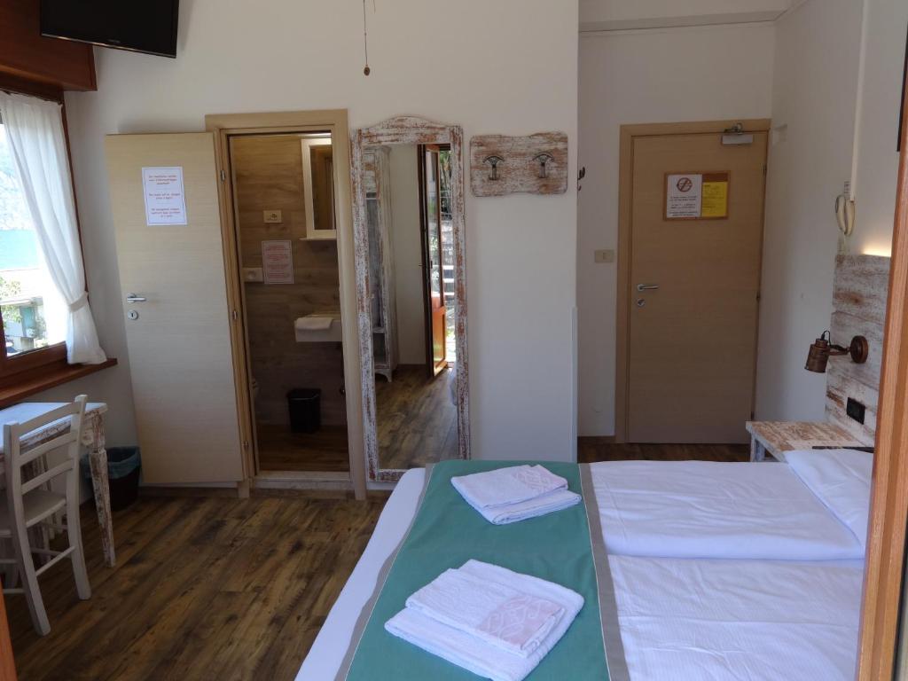 Postel nebo postele na pokoji v ubytování B&B Casa Gabriele