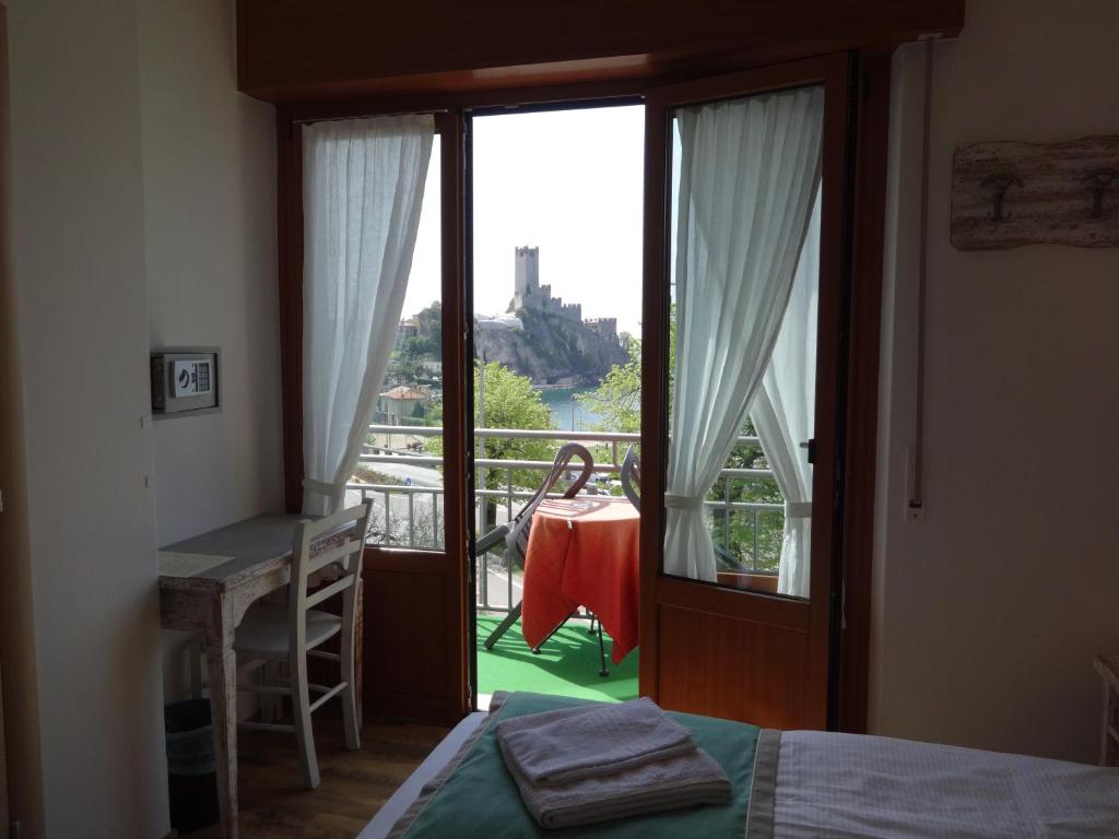 Postel nebo postele na pokoji v ubytování B&B Casa Gabriele