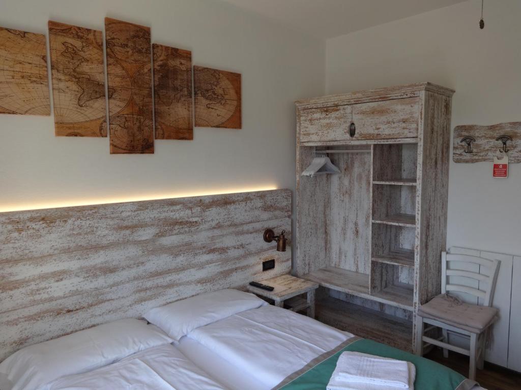 Postel nebo postele na pokoji v ubytování B&B Casa Gabriele