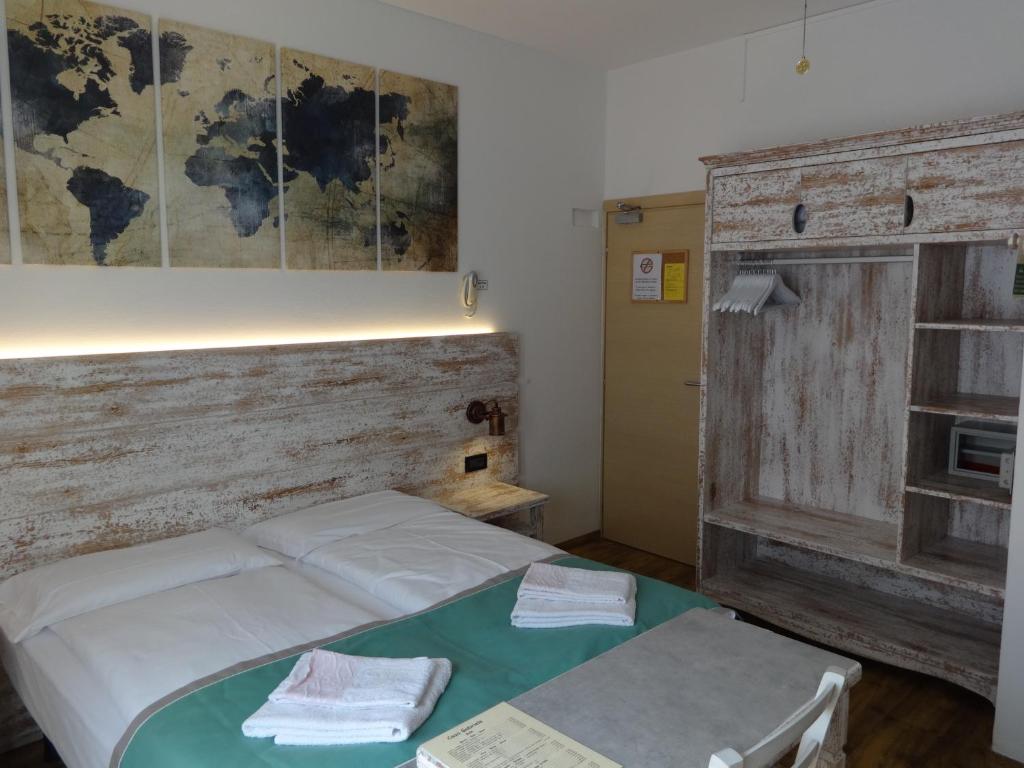 Postel nebo postele na pokoji v ubytování B&B Casa Gabriele