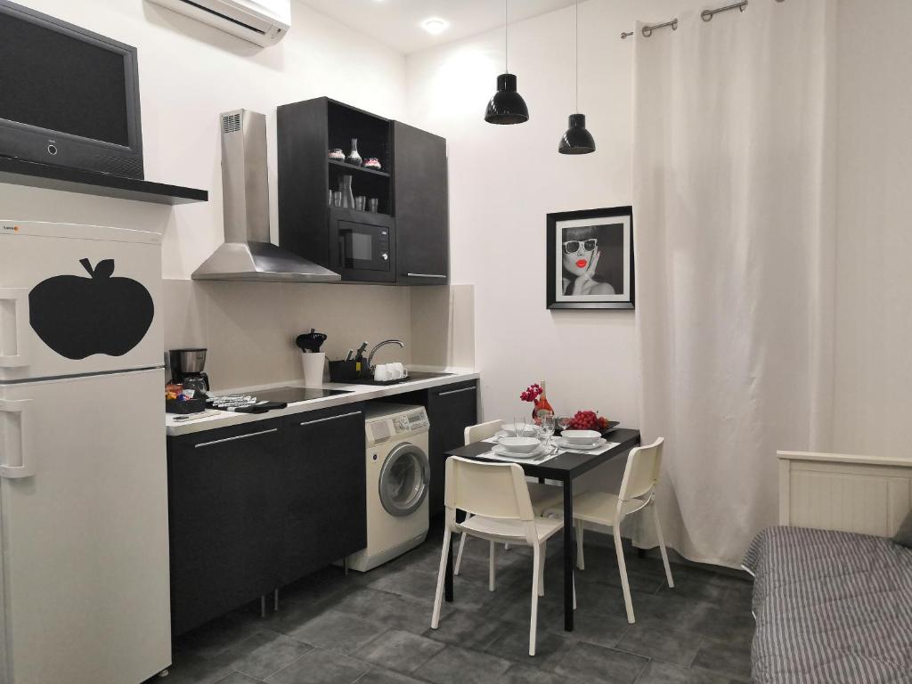 Kuchyňa alebo kuchynka v ubytovaní ASV Apartments