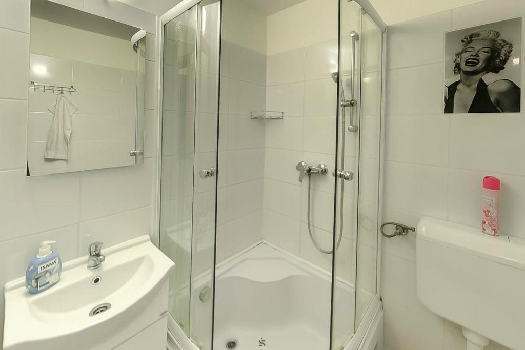 Kúpeľňa v ubytovaní Hajnalház Apartments