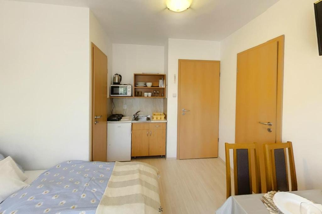 Kuchyňa alebo kuchynka v ubytovaní Hajnalház Apartments